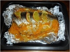 Запеченный толстолобик с апельсином