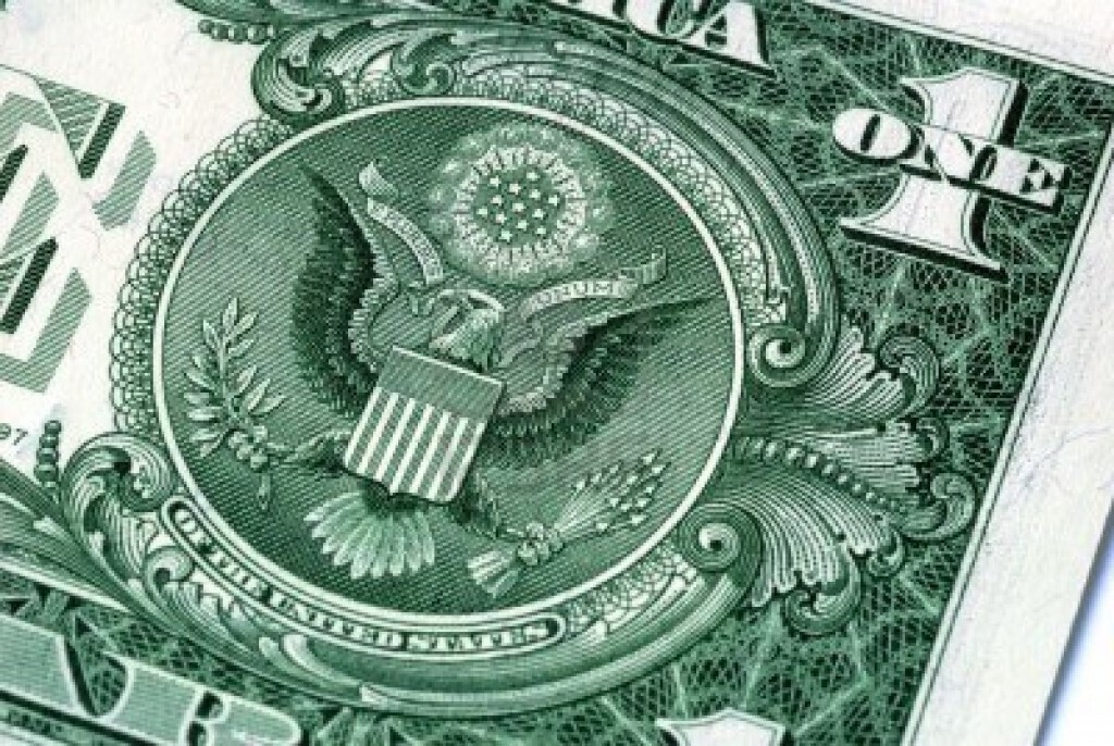 Что за символ указан на долларе?