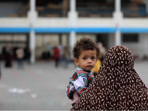 Люди призывают к немедленному прекращению огня в Газе