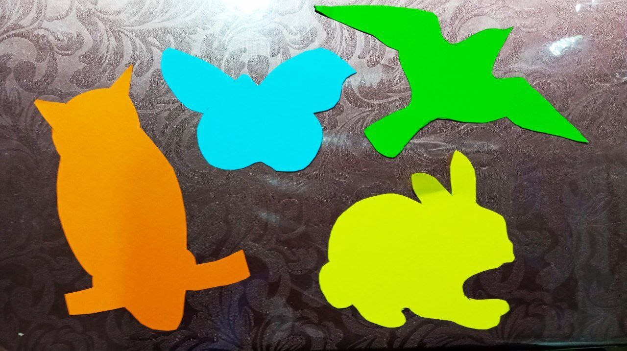 На прогулку с детьми с бумажными шаблонами животных и птиц