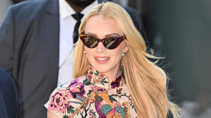 Линдси Лохан говорит, что слава вынудила ее покинуть Голливуд ...